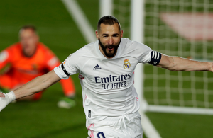 Benzema double sends Real top of La Liga