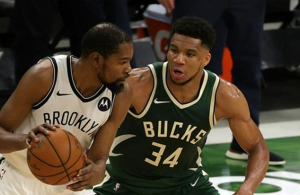 Antetokounmpo powers Bucks over Nets in NBA return