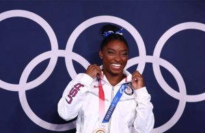 Many 'twisties' and turns, but Simone Biles exits Games a champion