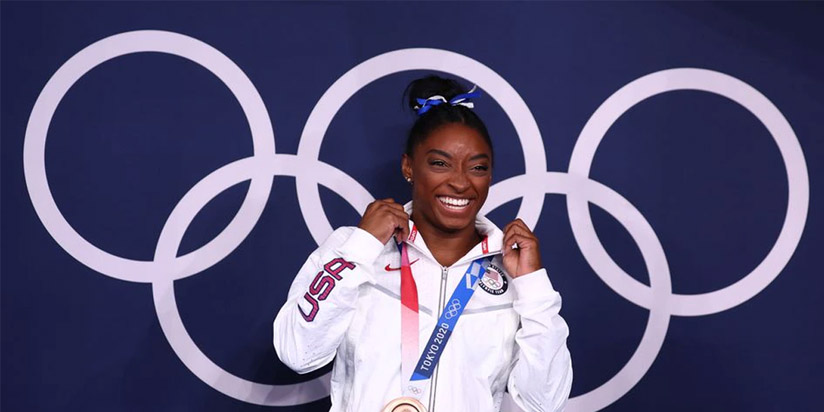 Many 'twisties' and turns, but Simone Biles exits Games a champion