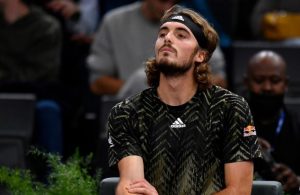 Greek Tsitsipas retires in Paris with arm issue, Sinner loses