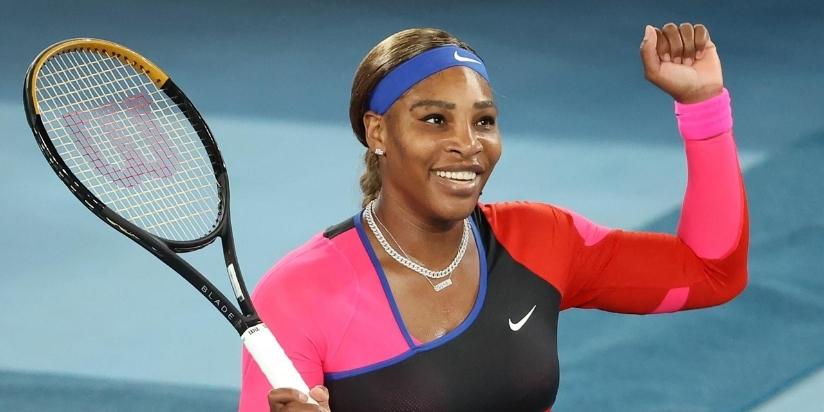 Serena Williams waves after a match